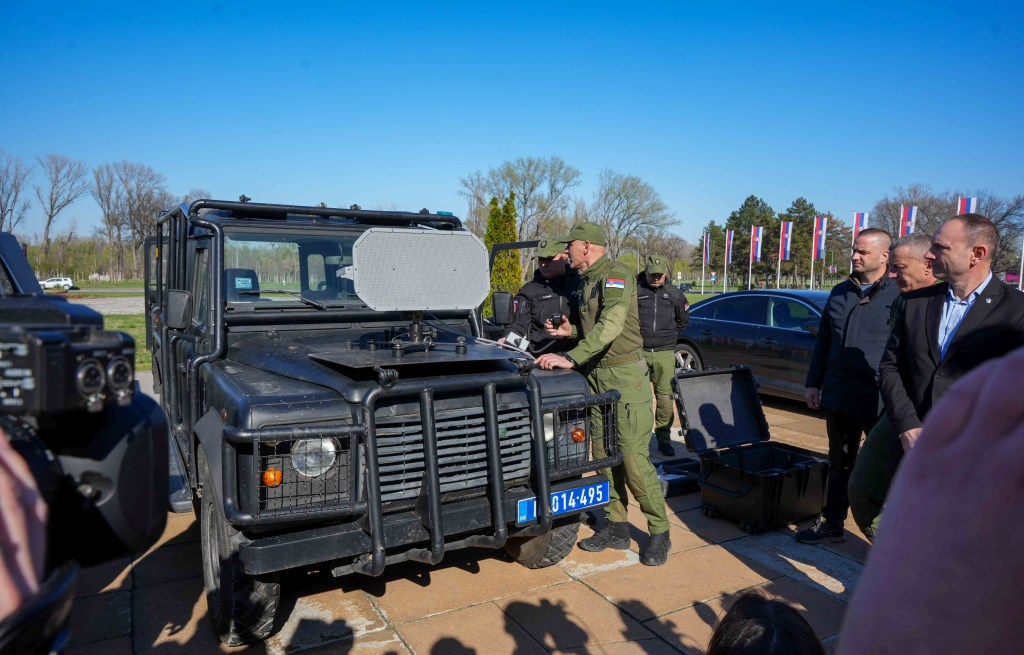 Serbian officials show LRAD devices to members of the press.