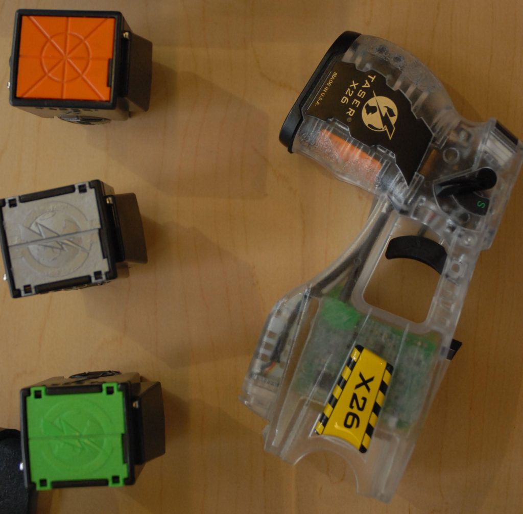 Taser X26 device with three cartridges.